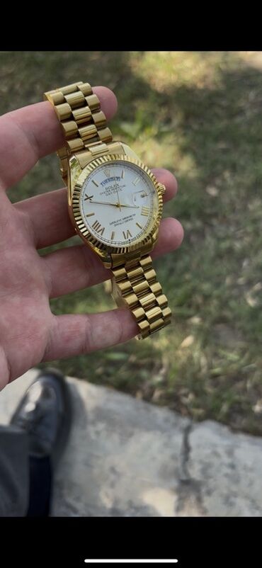 kişi üçün yun şap şaplar: Qol saatı, Rolex, rəng - Qızılı