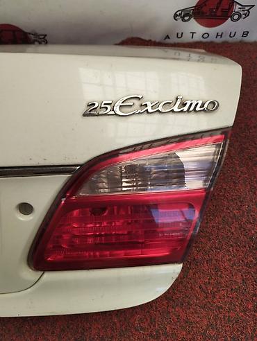 aimb g3: Фонарь крышки багажника правый для NISSAN Cefiro A33 (рестайлинг, 2002 — 1