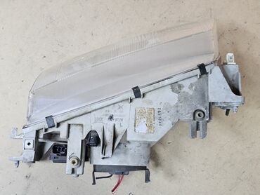 Передние фары: Передняя левая фара Mazda 1996 г., Б/у, Оригинал — 10