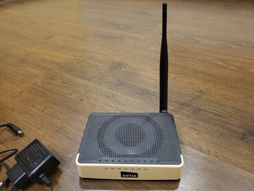 беспроводной модем yota 4g: WiFi роутер Netis WF2411R, 4 порта LAN, 1 WAN, 2.4 ГГц Wi-Fi 4