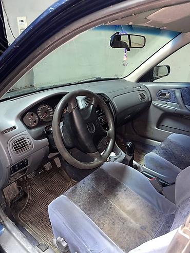 червяк 124: Mazda 323: 1999 г., 1.5 л, Механика, Седан — 5