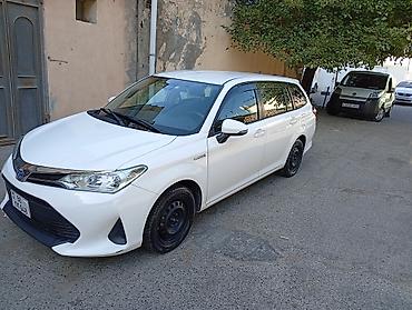bort baqaj: Toyota Corolla Fielder Hybrid, ağ rəng, universaI kuzov. Texniki — 4