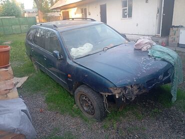 аварийная автомобили: Nissan Primera: 1999 г., 2 л, Механика, Бензин, Универсал