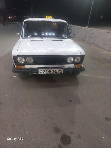 opel astra k: Ağ rəngli VAZ 2106 sedan – klassik model. Şəhər içi sərnişin — 3