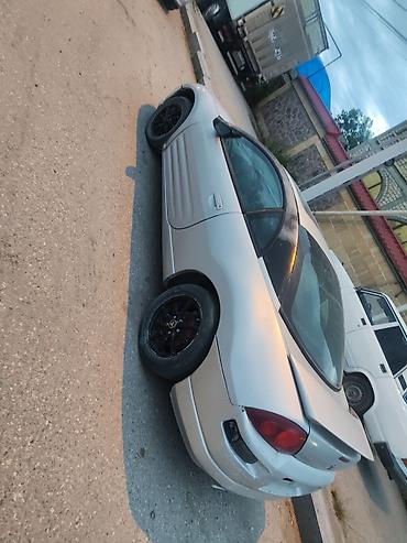 124 kupe: Mitsubishi Eclipse kupе (təxmini 2000–2005 buraxılışı) - Korpusu: 2 — 1