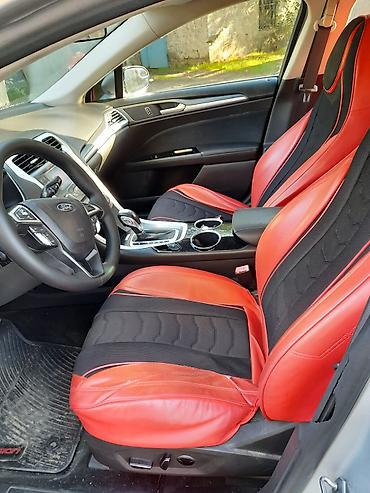 ford: Ford Fusion sedan satılır. Avtomobil gümüşü rəngdədir və zərif — 10