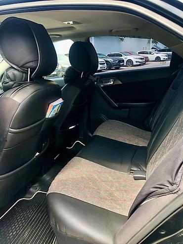 Kia: Kia Cerato: 1.6 l | 2011 il Sedan — 11