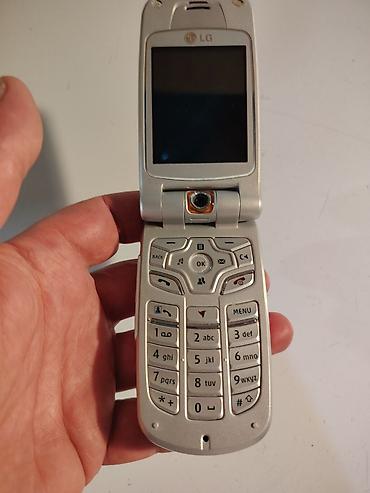 plafonska ventilacija: LG preklopni mobilni telefon (crveno‑srebrni), sa spoljnim ekranom i — 8
