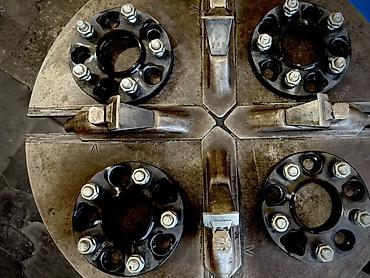 qalın teker: Məhsul: Təkər aralayıcı (Wheel Spacer) Texniki göstəricilər: - Bolt — 3