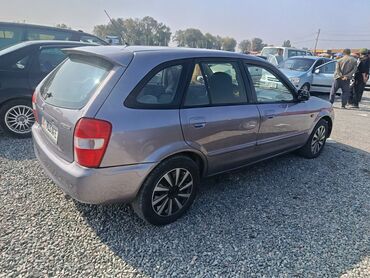 машина марк: Mazda 323: 2003 г., 1.6 л, Механика, Бензин, Хетчбек