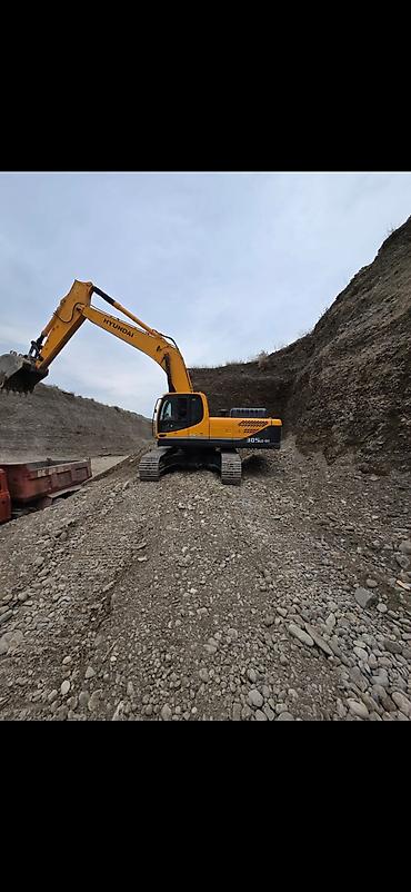 13 diski teker: Hyundai 305LC-9T paletli ekskavator - Güclü dizel mühərrik və 30–32 — 1