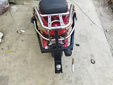 Скутеры: Электроскутер (класс 50–150 см³ эквивалент), городской Описание: - — 1