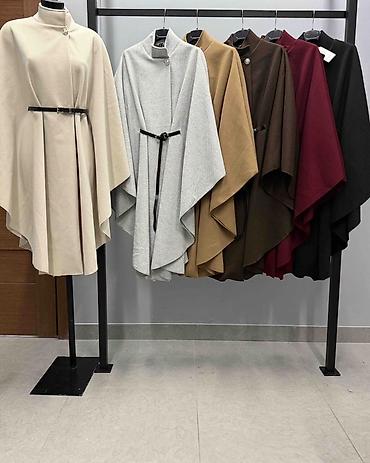 cizme lakovane: Dugačak pončo: 3600 dinara
S M L XL — 6