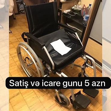 servis arabasi: Mexaniki əlil arabası – satış və icarə. İcarə: günü 5 AZN (şəkildə — 2