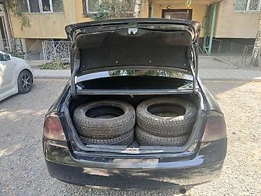 колонку: Honda Civic: 2010 г., 1.3 л, Вариатор, Гибрид, Седан — 7