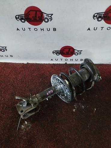 low ll: Амортизатор передний левый для Nissan Altima L32, двигатель QR25DE — 1