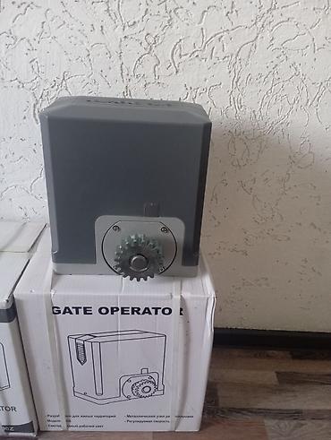 Откатные ворота: Моторчик для автоматизации откатных ворот массой до 1 000кг. Двигатель — 11