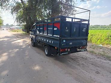 inter: Hyundai Porter — компактный бортовой/фермерский грузовик синего цвета — 3