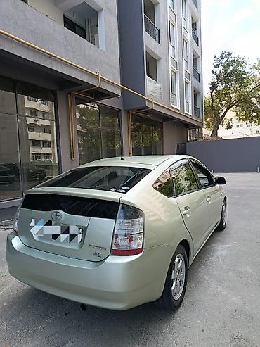 disk: Toyota Prius (2-ci nəsil) hibrid hetçbek - Rəng: açıq yaşıl/metalik - — 2