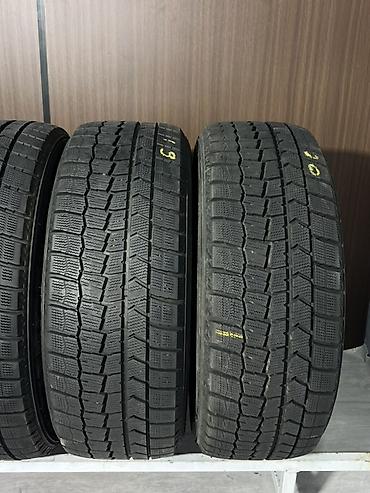 Шины: Комплект из 4 зимних шин Dunlop 215/55 R17 94Q (без шипов). - Тип — 2