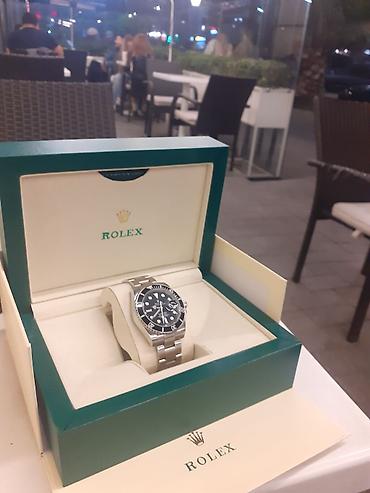 meta eynek: Rolex qol saatı təqdim olunur.Yenidir istifadə olunmayib.Qutusu — 1