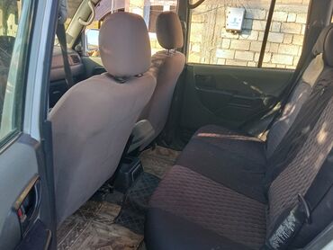 Mitsubishi: Mitsubishi Pajero iO 5 qapı SUV - Kuzov: ağ rəng, 5 qapı, arxa qapıda — 8