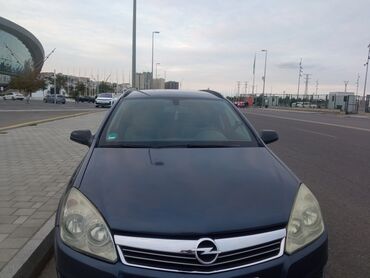 Opel: Opel Astra H – 5 qapılı hetçbek Xüsusiyyətlər: - Kuzov: tünd göy — 13