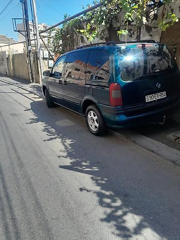 Opel: Opel Sintra miniven - Gövdə tipi: Miniven, 5 qapı - Rəng: Tünd yaşıl — 1