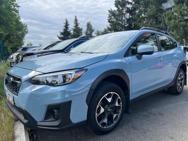левый руль форестер: Subaru Crosstrek светло-голубого цвета с черными элементами отделки