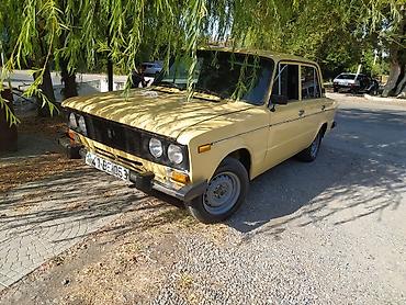 vaz 2106 şit: VAZ 2106, sarı rəng, sedan kuzov. Xüsusiyyətlər: - Arxa ötürücülü — 5