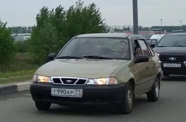 обшивка двери нексия 1: Daewoo Nexia: 1999 г., Механика, Бензин, Седан