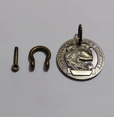 Heyvanlar üçün digər mallar: İt medalyonları (identifikasiya nişanı) satılır. Material: metal — 12