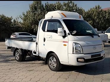 kia porter: Hyundai Porter II бортовой грузовик Кузов и экстерьер: - Бортовая — 2