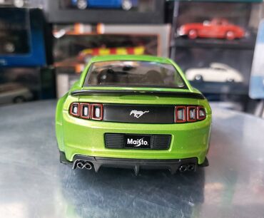 Avtomobil modelləri: Коллекционная модель Ford Mustang Street Racer Green black 2014 — 5