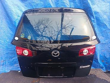 demio: Mazda demio 5 крышка багажника — 1