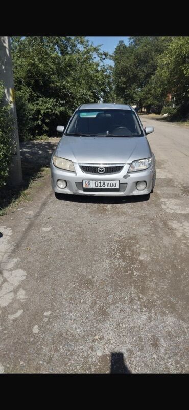 кузов 2104: Mazda 323: 2003 г., 2 л, Механика, Газ, Хэтчбэк