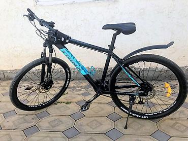 marin велосипед: Горный велосипед 27.5" Trek (серия Marlin, черный с бирюзовым принтом) — 1