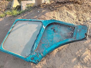 Digər kuzov detalları: Məhsul: Traktor kabini (köhnə model, mavi rəng) Təsvir: - Universal — 7