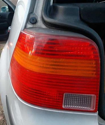 tabla u autu: STOP LAMPA LEVA ZA VOLKSWAGEN GOLF 4 | Stop lampa leva za Golfa 4 — 1