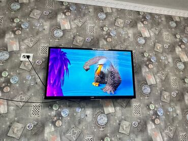 магазин запчастей для швейных машин: LED-телевизор LGA, диагональ около 32" (настенное крепление)
