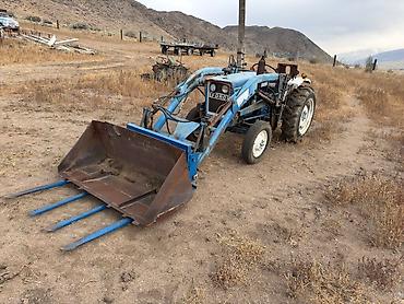 КУНы: Трактор Ford 1600 2WD с фронтальным погрузчиком мощностью в 25 — 2