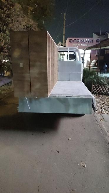 Портер, жүк ташуу: Буйрутма берүү Лабо, Эмерек ташуу, Жүк ташуучу жумушчусу менен — 3