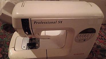 komputer noutbuk: Məhsul: Singer Professional SX tikiş maşını Xüsusiyyətlər: - Brend — 2