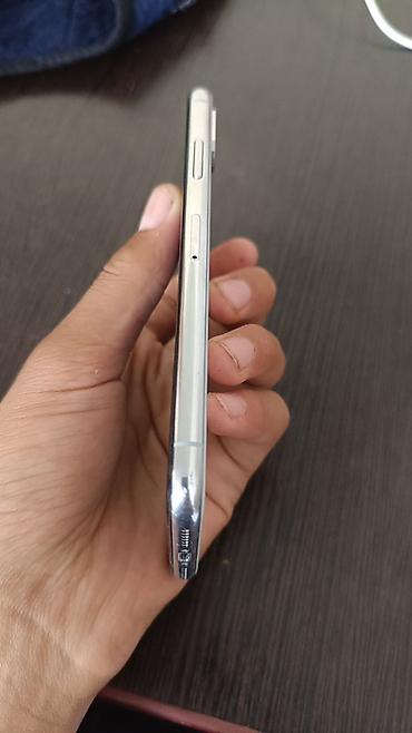 oc cinema: IPhone X, Б/у, 256 ГБ, Серебристый, Зарядное устройство, Чехол, 100 % — 2