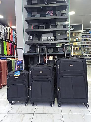 Чемоданы: Səyahət üçün tekstil təkərli çamadan dəsti - Rəng: qara - 3 ölçü — 1