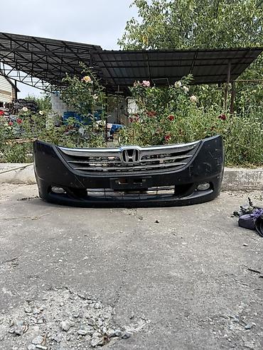 Передний бампер Honda stepw RG с решеткой радиатора. - Материал at lalafo.kg Передний бампер Honda stepw RG с решеткой радиатора. - Материал
