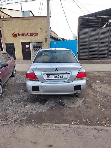 Mitsubishi: Mitsubishi Lancer: 2005 г., 1.3 л, Механика, Бензин, Седан — 4