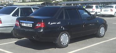 small car: Daewoo Nexia: 2012 г., 1.5 л, Механика, Бензин, Седан — 4