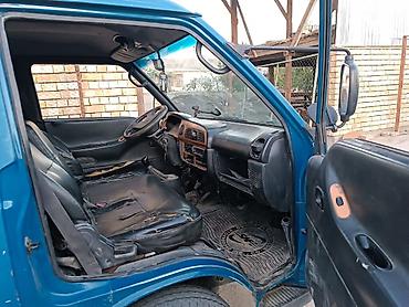 запаска шин: Hyundai Porter (портёр) — малотоннажный бортовой грузовик - Кузов — 2