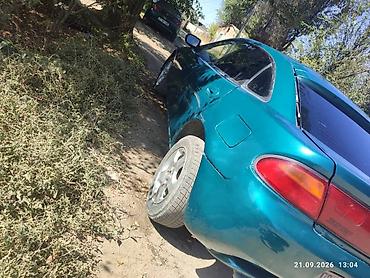 зарядка электровелосипеда: Mazda 323: 1996 г., 1.8 л, Механика, Бензин, Седан — 6